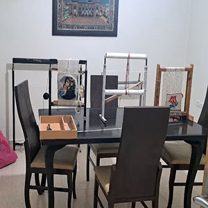 a room with table and chairs