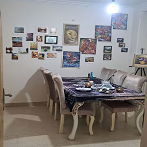 a room with table and paints